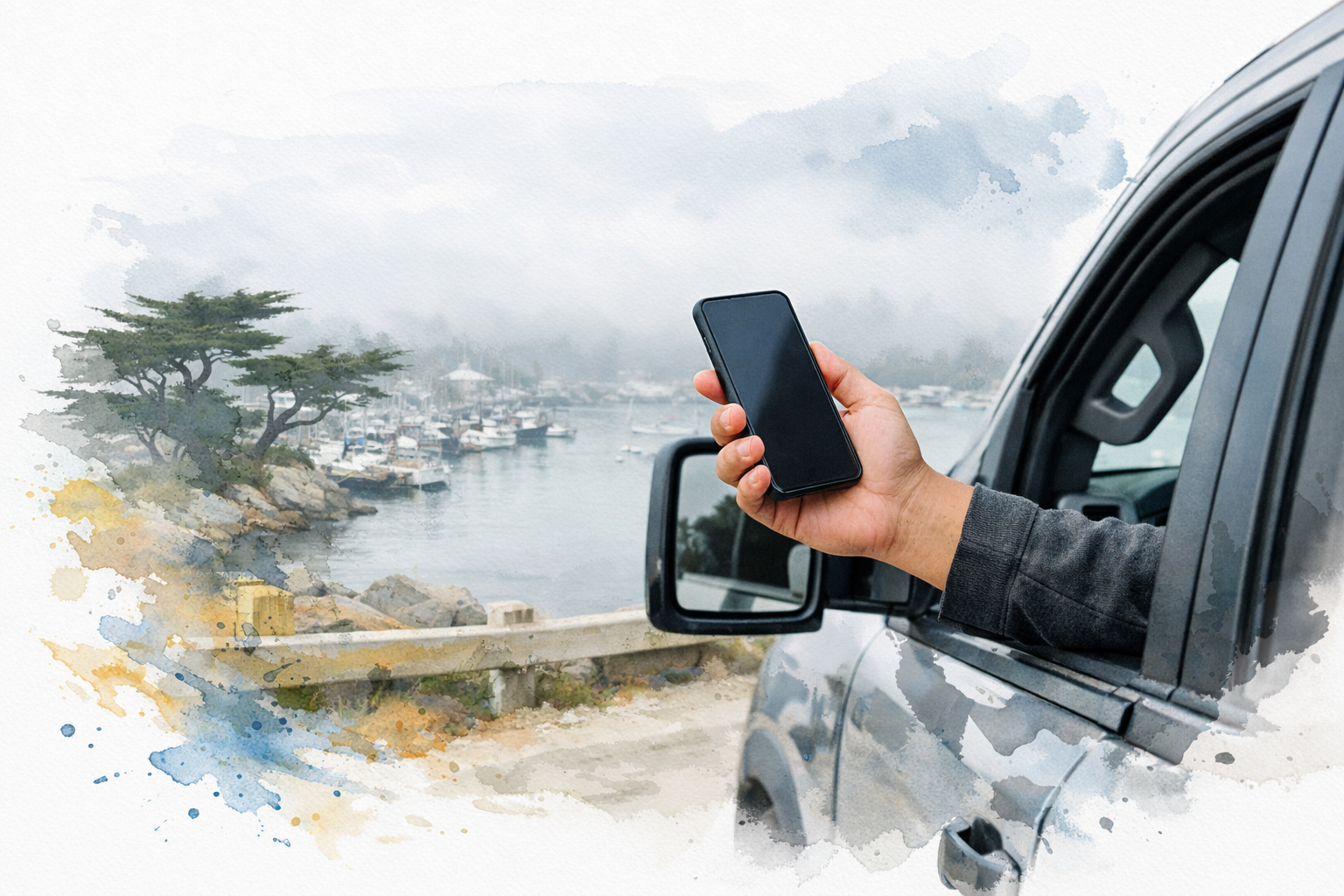 Hand holding a phone out a work truck window at a foggy Monterey Peninsula harbor overlook